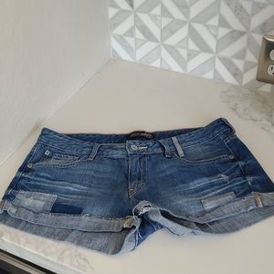 Levi's jean shorts with patches in new condition